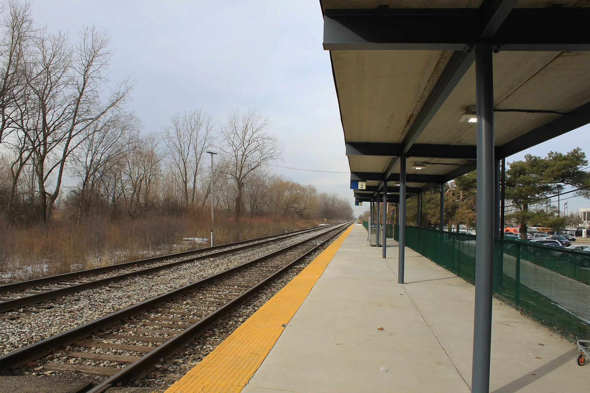 Amtrak station loading platform, 16121 Michigan Avenue, Dearborn, Michigan. First-time train travelers get boarding and luggage wrong on an Amtrak weekend